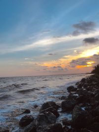 Scenic view of sea against sky during sunset