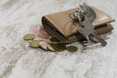 High angle view of coins on table