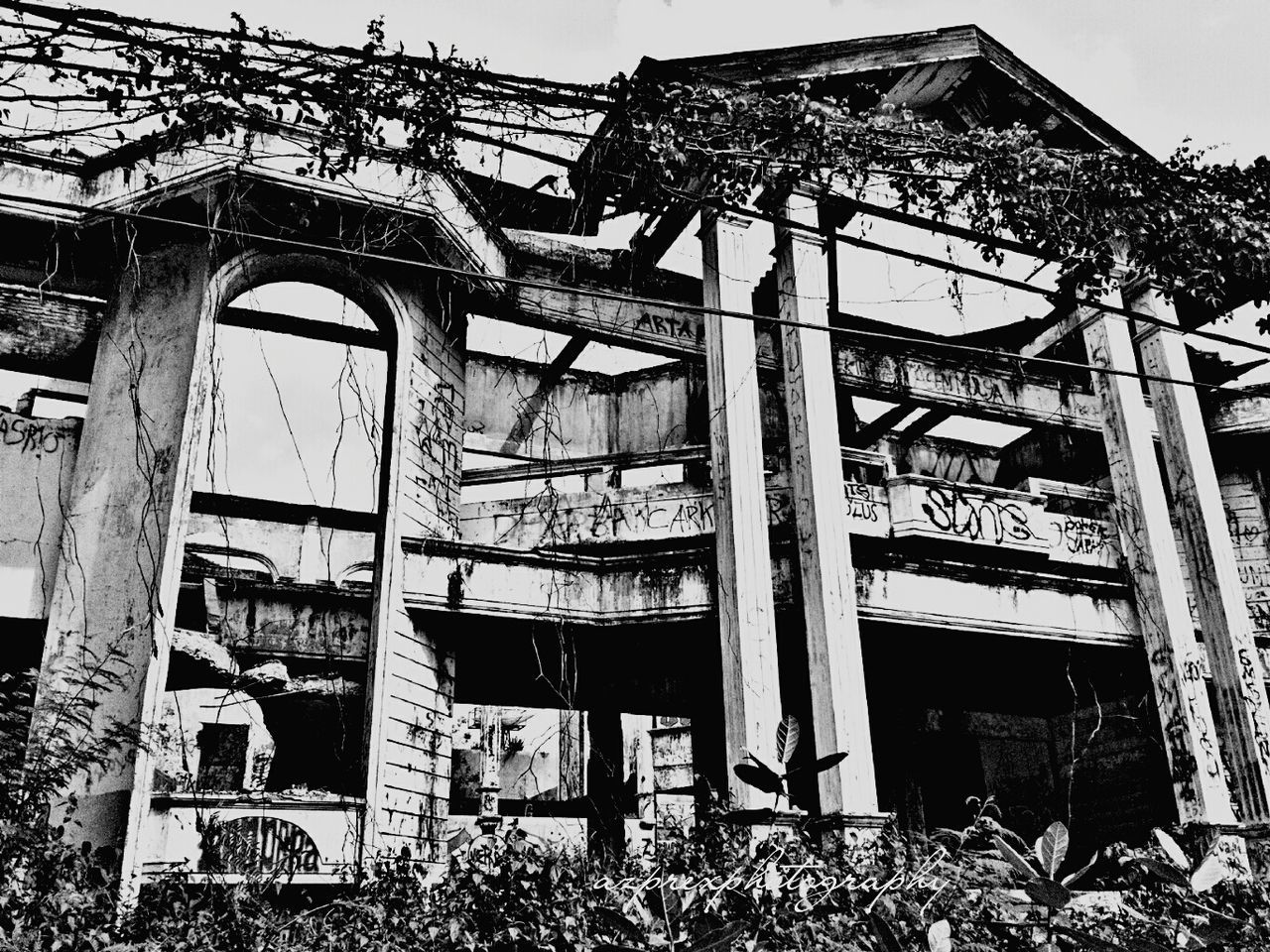 architecture, built structure, building exterior, abandoned, low angle view, damaged, obsolete, old, run-down, deterioration, house, roof, window, building, bad condition, day, clear sky, weathered, destruction, sky