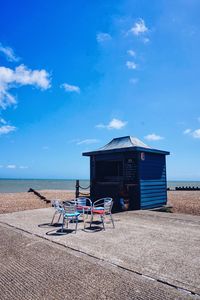 View of beach against blue sky