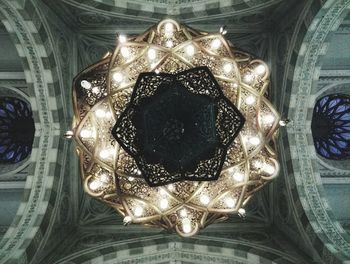 Low angle view of illuminated chandelier