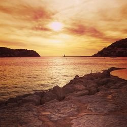 Scenic view of sea during sunset