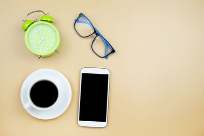 High angle view of coffee cup on table