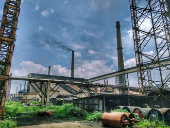 Low angle view of abandoned building against sky