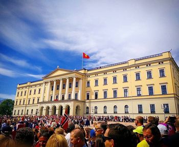 Group of people in front of building