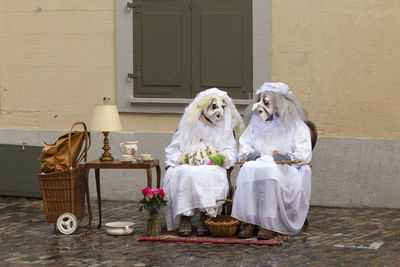 Rheinsprung, basel, switzerland, march 13, 2019. carnival participants disguised in dressing gowns