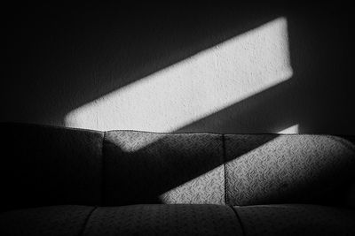 Shadow of sunlight falling on wall at home