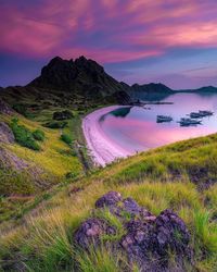 Scenic view of lake against sky during sunset