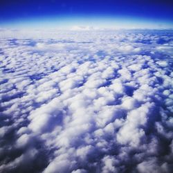 Aerial view of clouds over blue sky