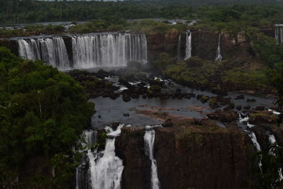 Scenic view of waterfall in forest