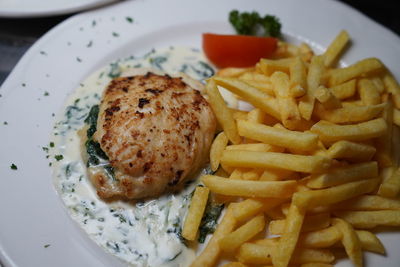 Close-up of fried egg served in plate