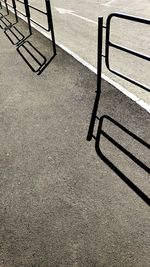 High angle view of empty chair on road