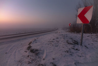 Scenic view of beach against sky during sunset