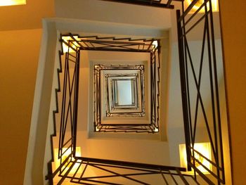 Low angle view of spiral staircase in building