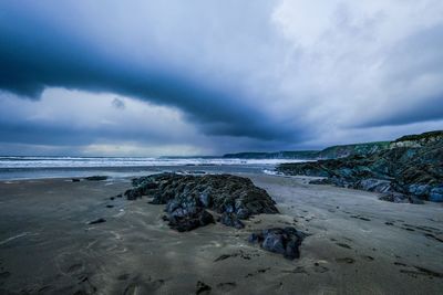 Scenic view of beach against sky