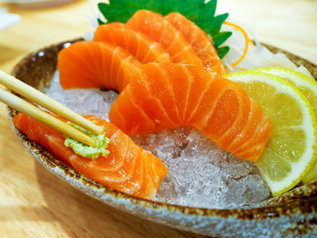 Close-up of seafood served on table