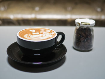 Coffee cup on table