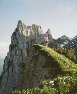 Scenic view while hiking on a ridge in the swiss alps. shot on medium format kodak portra 400 film.