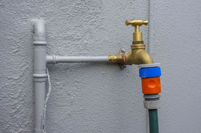 Close-up of pipe on wall