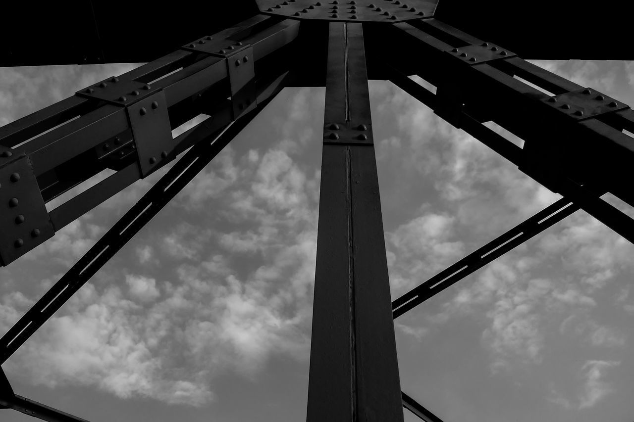 LOW ANGLE VIEW OF CRANE AT CONSTRUCTION SITE