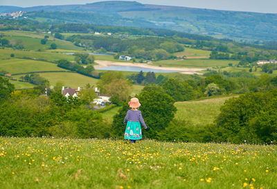 Full length of man on field against mountains