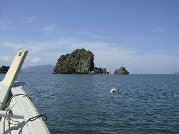 Scenic view of sea against blue sky