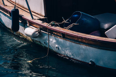 Boat moored at lake