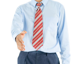 Midsection of man standing against white background