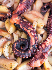 High angle view of mushrooms on barbecue