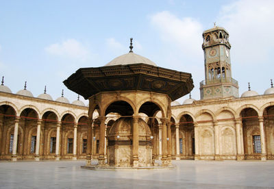 Ancient clock in the courtyard of muhammad ali mosque at cairo, egypt