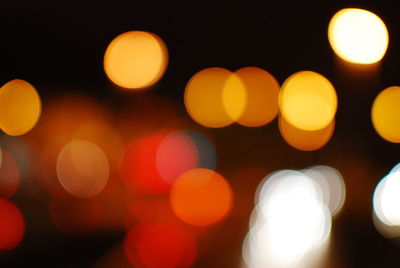 Close-up of illuminated christmas lights at night