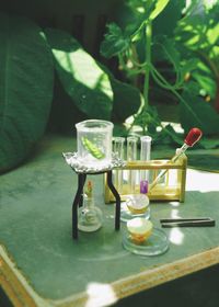 Close-up of wine glasses on table