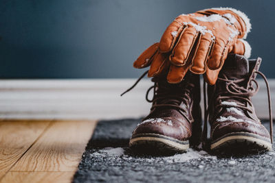 Low section of shoes on table