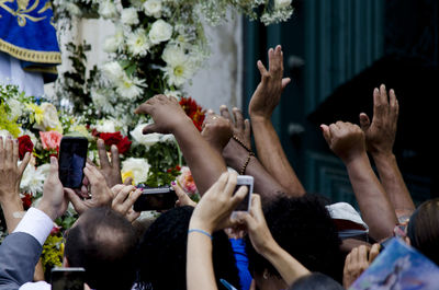 Group of people photographing using mobile phone