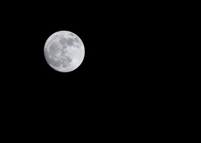 Scenic view of moon against sky at night