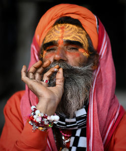 Portrait of an old man smoking