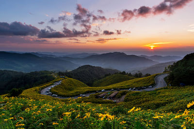 Scenic view of mountains against sky during sunset