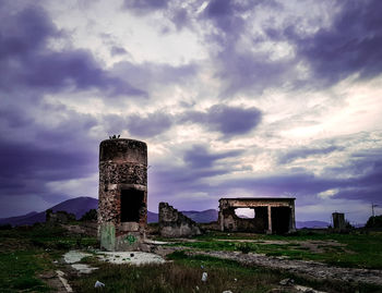 Low angle view of old ruin against sky