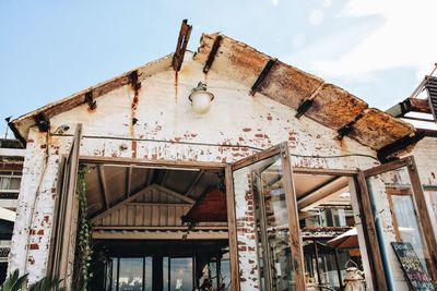 Low angle view of damaged building