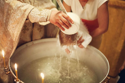 Midsection of woman preparing food