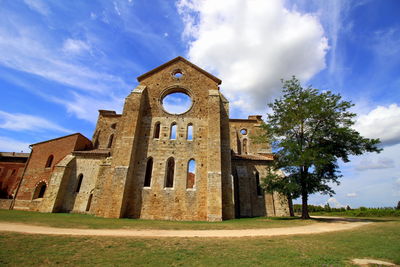 Low angle view of historic building against sky