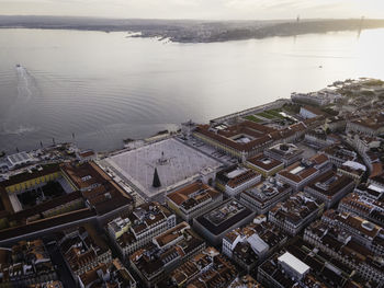 High angle view of river by buildings in city