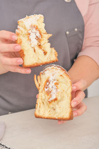 Midsection of man holding food