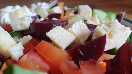 Close-up of chopped fruits in plate