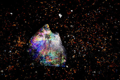 Abstract image of multi colored light painting against black background