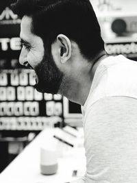 Portrait of young man looking away