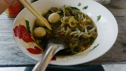 Close-up of noodles in bowl on table