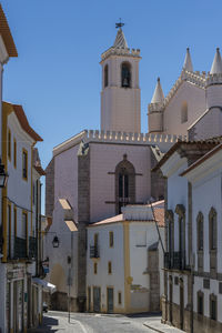 Low angle view of buildings against clear sky