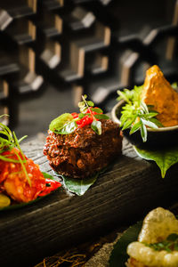 Beef rendang in haute cuisine style, among other padangnese dishes