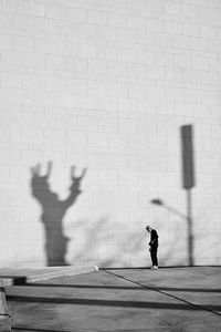 Shadow of man on wall